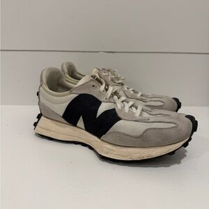 [8] New Balance Cream and Black Athletic Shoes